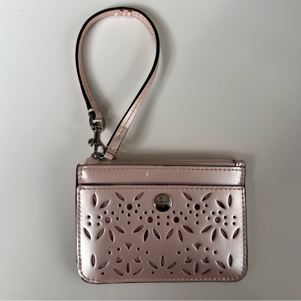 Pink coach card holder with zipper, wrist strap, and key chain